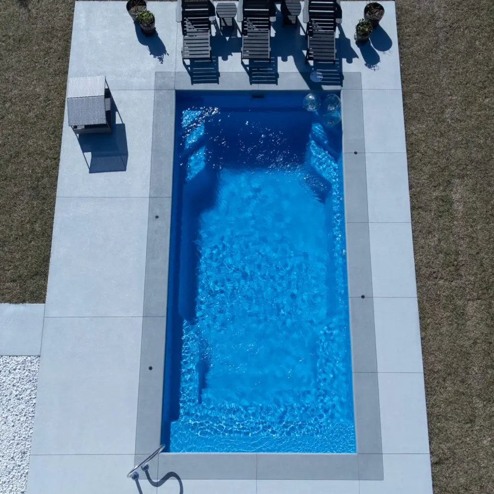 Laguna fiberglass pool in California Shimmer by ProGuard Backyards