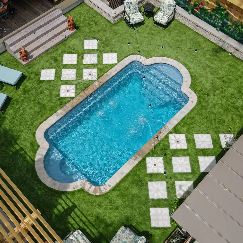 Aerial view of a Milano fiberglass pool by ProGuard Backyards in upstate New York
